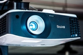 How often do you have to replace the bulb in a projector? - An image of a BenQ projector.