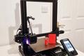 How much is a 3D printer; an image of the Spark 3D SP1 printer on a table. 