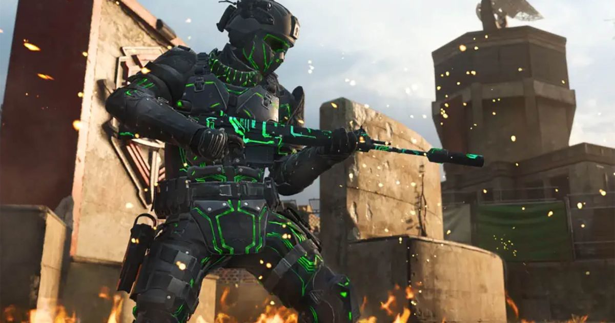 Modern Warfare 3 player holding gun with flames on ground
