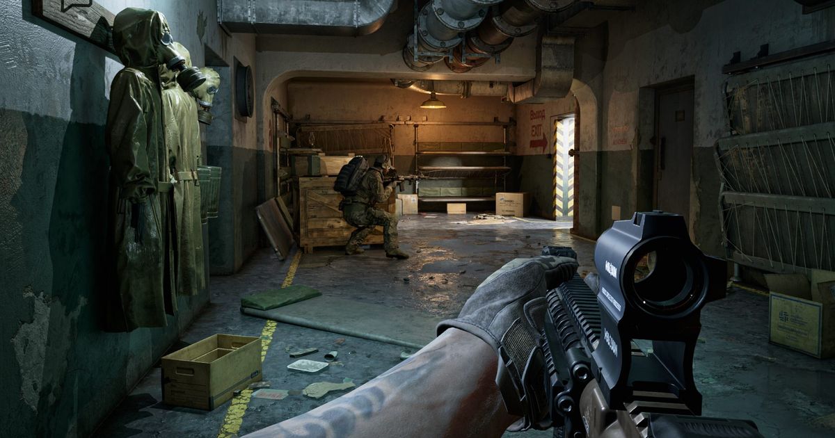 Gray Zone Warfare wipe: A first-person image of a player holding a rifle at the ready in a cluttered interior, with a teammate at the end of the hall.