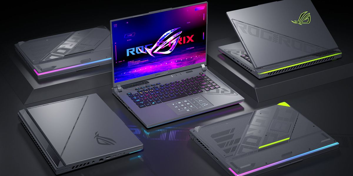 A group of Asus ROG Strix gaming laptops sit next to each other
