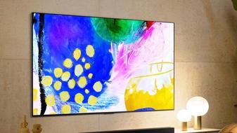 An LG C4 OLED TV hanging on the wall