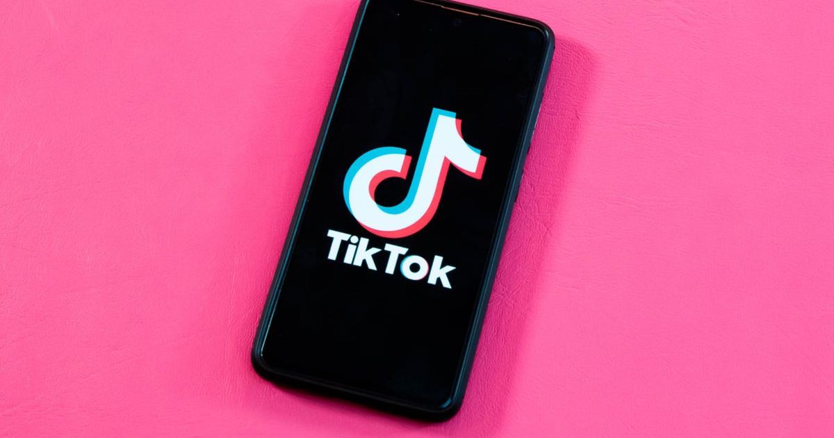WCD girl TikTok meaning - An image of the TikTok logo on a phone