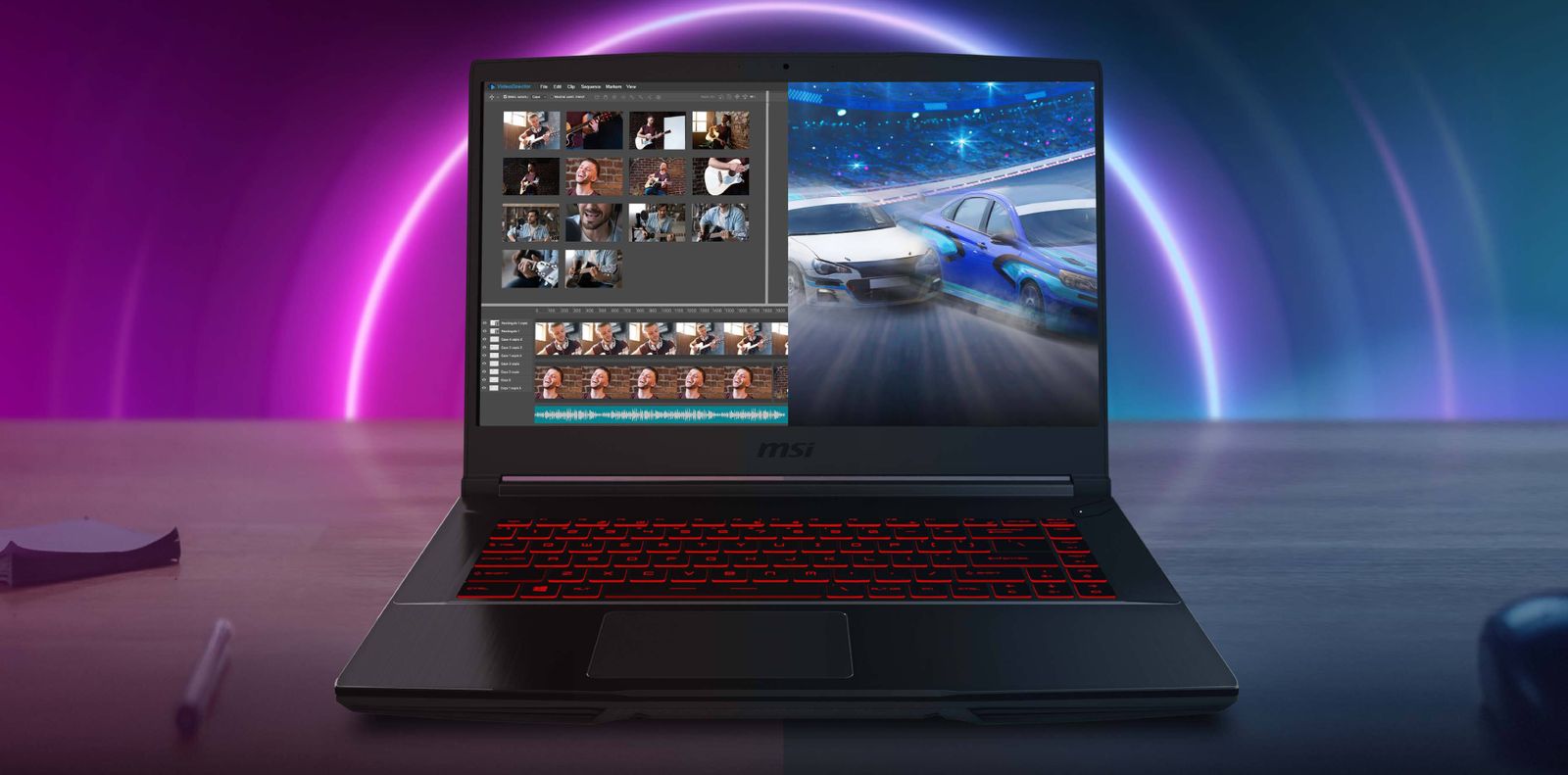 Image of a black laptop with red backlit keys and photos being edited along with racing gameplay on the displaysat on a desk.