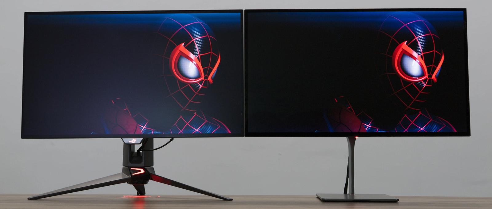 A Dough Spectrum Black 32-inch 4K 240Hz OLED gaming monior next to an Asus display of the same size, comparing the shininess of screens