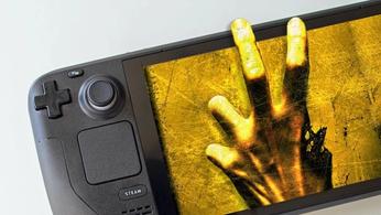 Steam Deck 2 - the original Steam Deck handheld with the Left 4 Dead 2 hand reaching out of the screen 