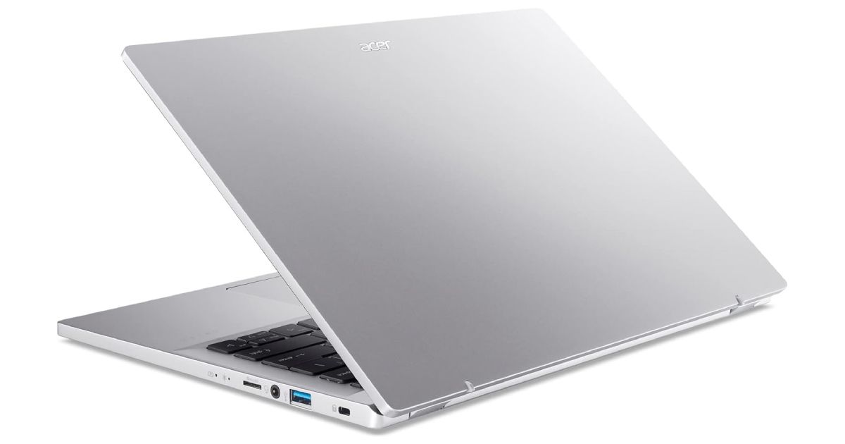 Acer Swift Go 14 product image of a silver laptop half-open with black keys.