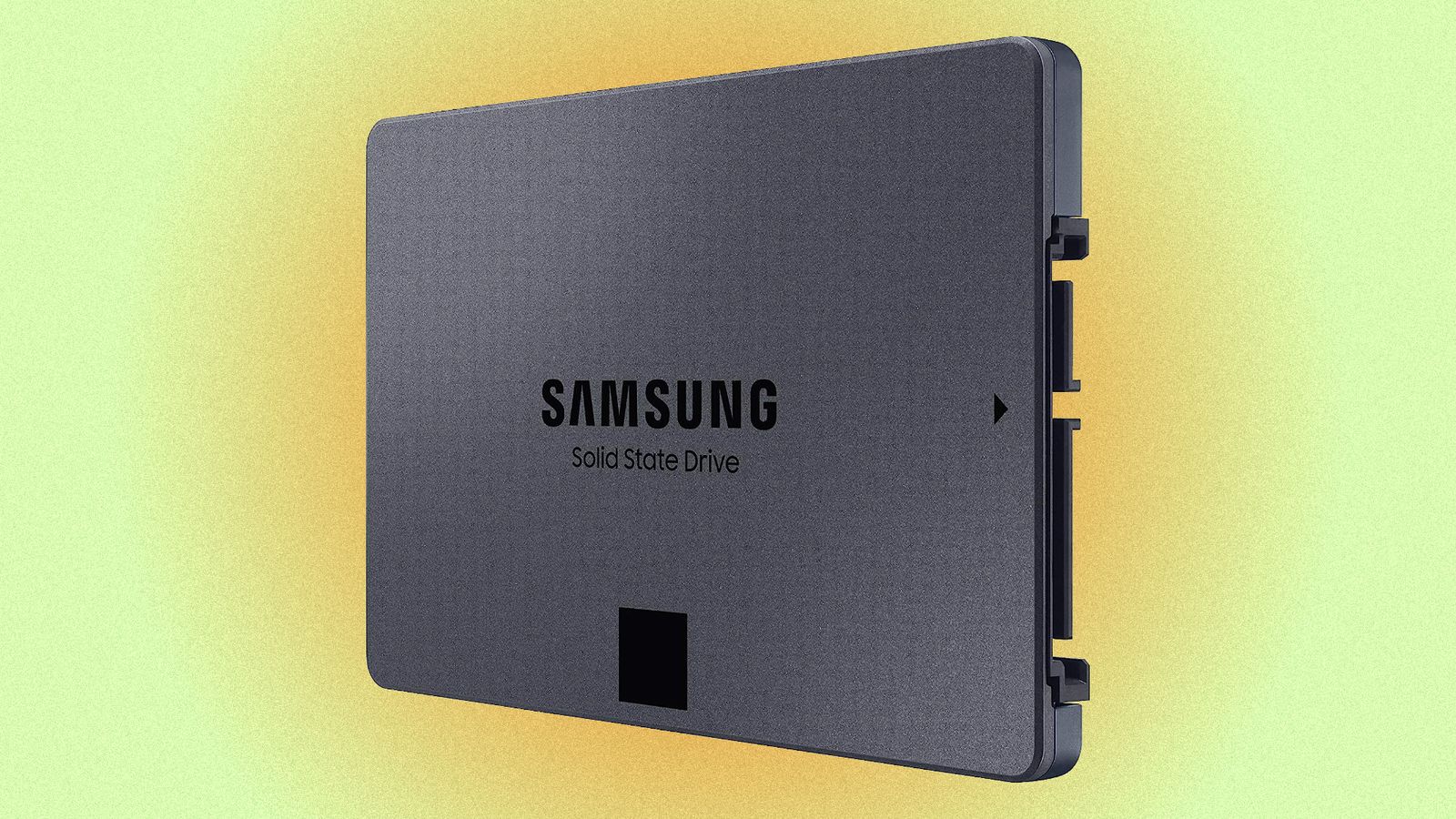 A Samsung 870 QVO SATA SSD against a green and orange background.