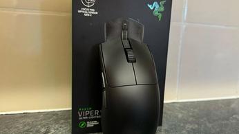Razer Viper V3 Pro in front of the box and a tiled wall