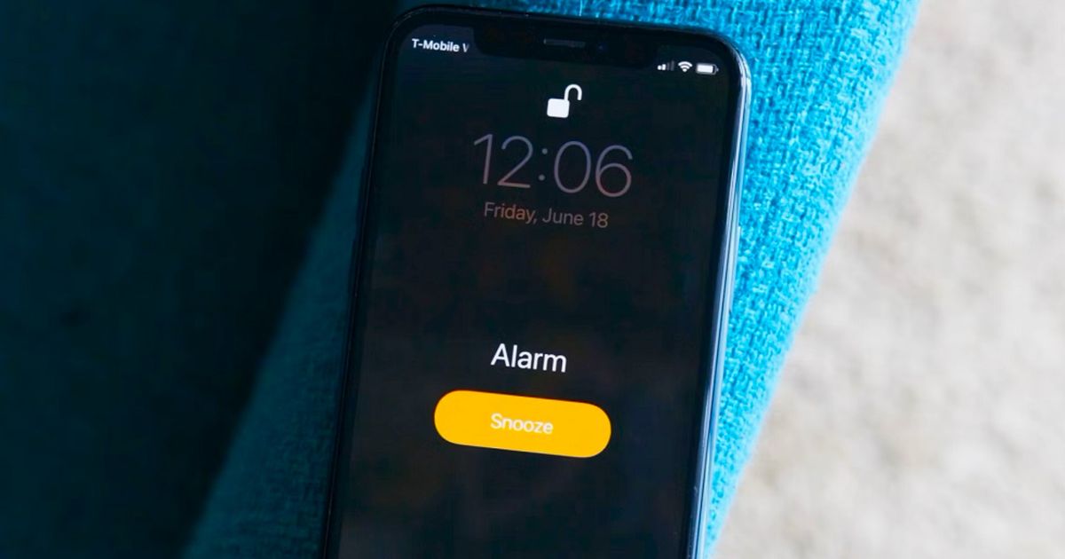 An image of an iPhone alarm go off during a call