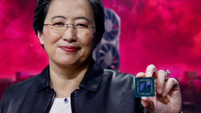 AMD CEO Lisa Su smiling as she underships Radeon GPUs