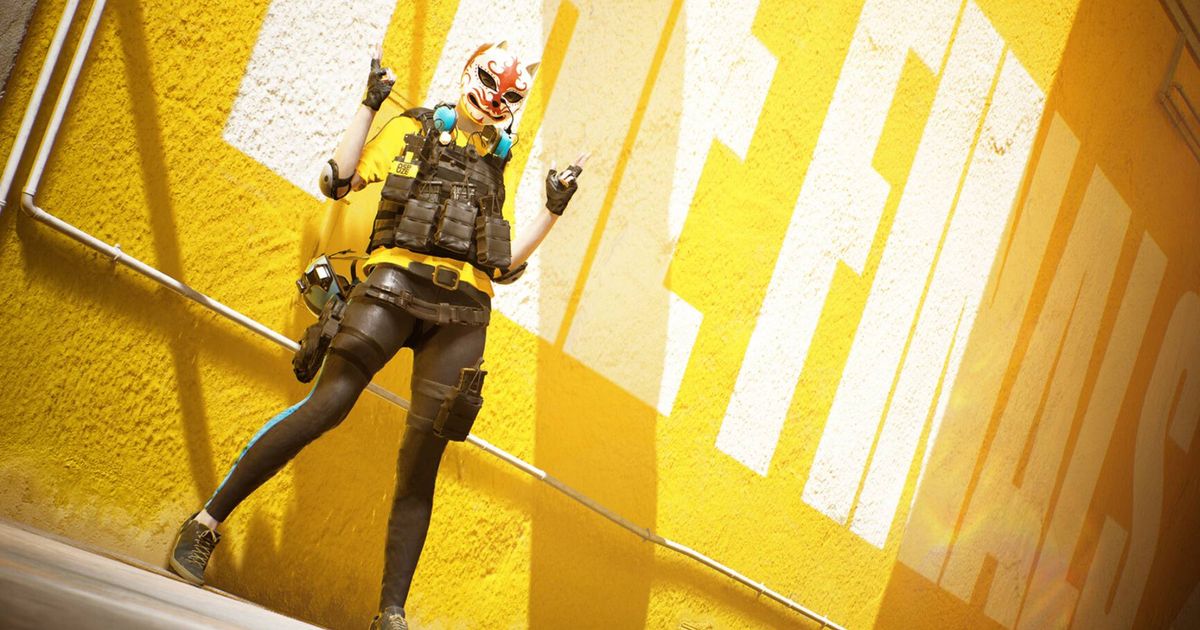 The Finals Steam Deck - An image of a masked in-game character leaning on an yellow wall