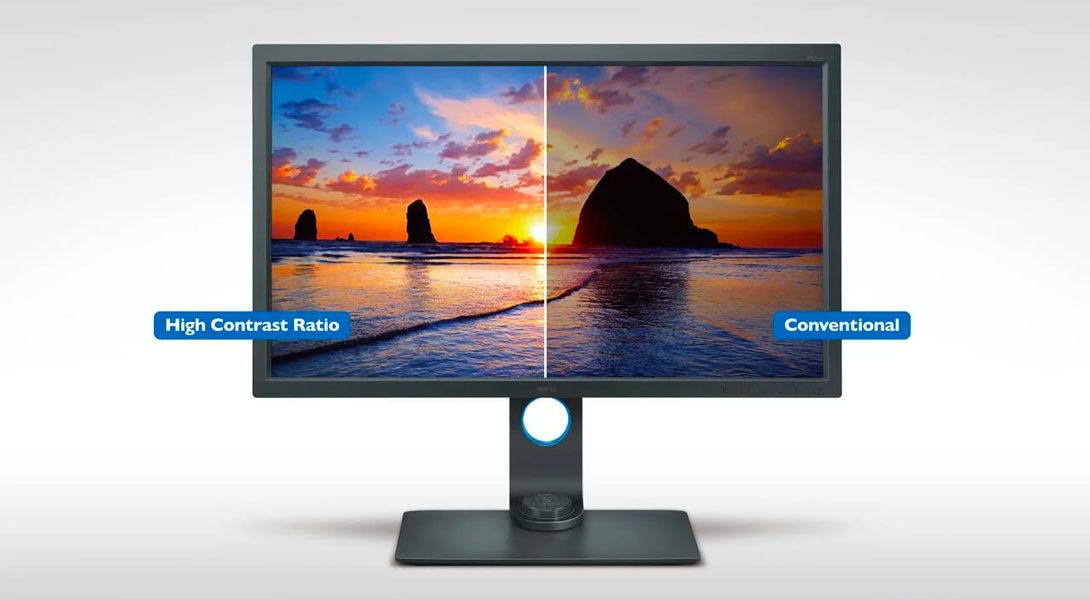 Image of a black monitor with a sunset scene on the display, one half in high contrast, the other conventional.