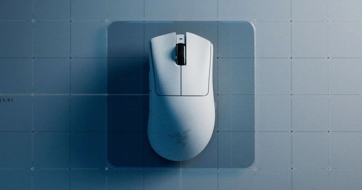 Image of a white wireless Razer mouse on a gridded, grey backdrop.