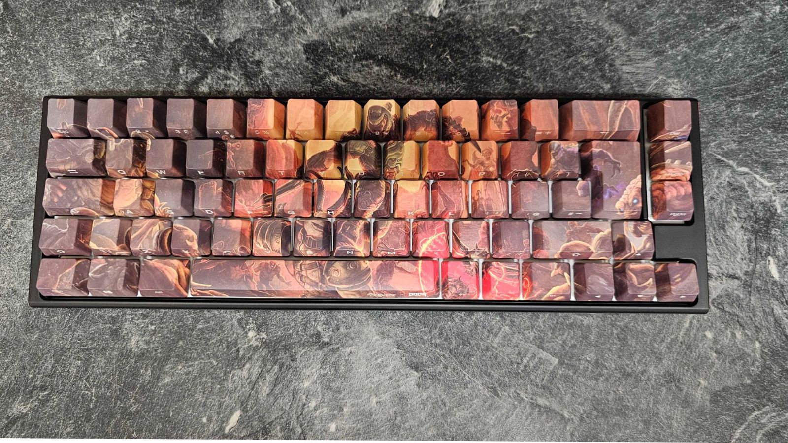 Ducky x DOOM One 3 SF keyboard on a marble counter