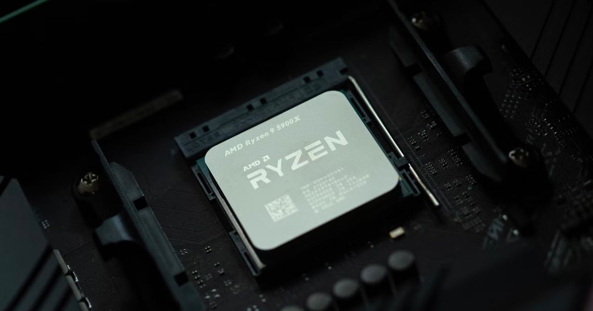 A silver RYZEN-branded motherboard chip.