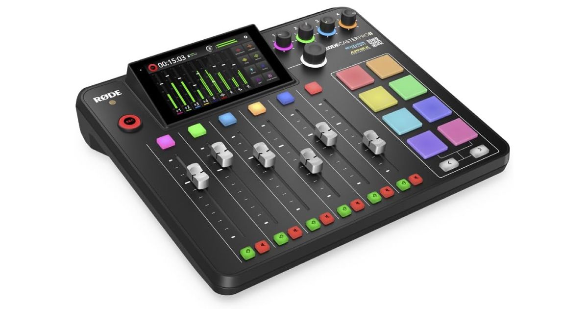 A black audio mixer featuring multicoloured buttons all over it.