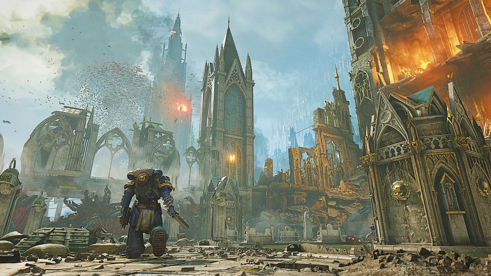 Warhammer 40k: Space Marine 2 - soldier in blue and gold walking through a ruined cathedral