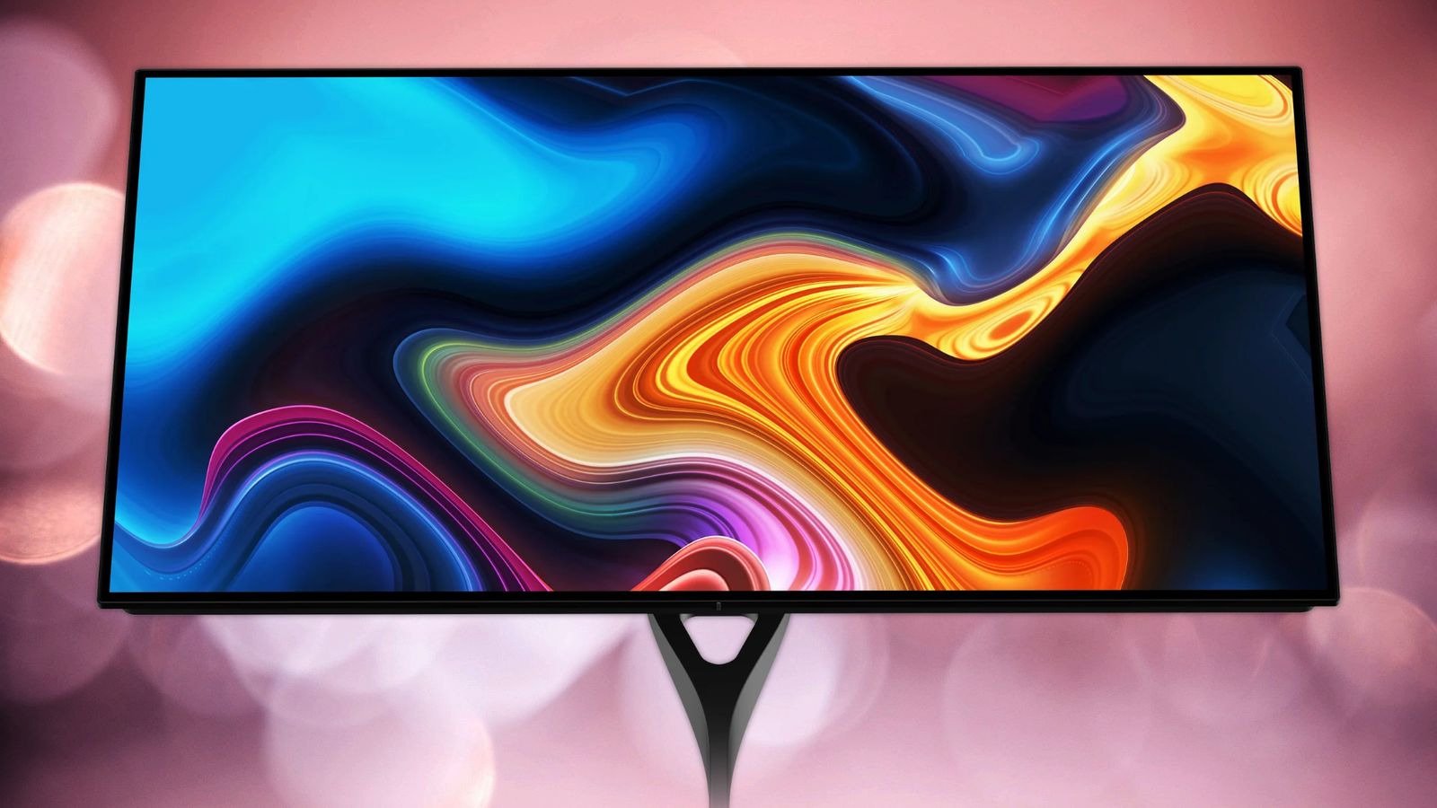 A Dough Spectrum One gaming monitor against a pink background