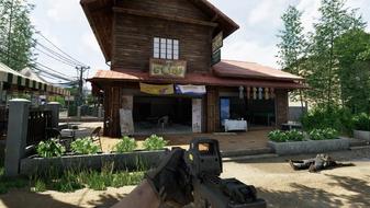A first-person screenshot of the player looking at a wooden house with a weapon at the ready.