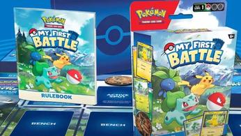 Pokémon TCG My First Battle render of a deck box, rulebook, playmat and coin 