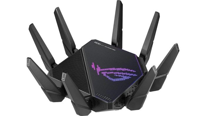 Best gaming router - ASUS ROG Rapture GT-AX11000 Pro product image of a black router with multiple antennae and a purple logo on the top.