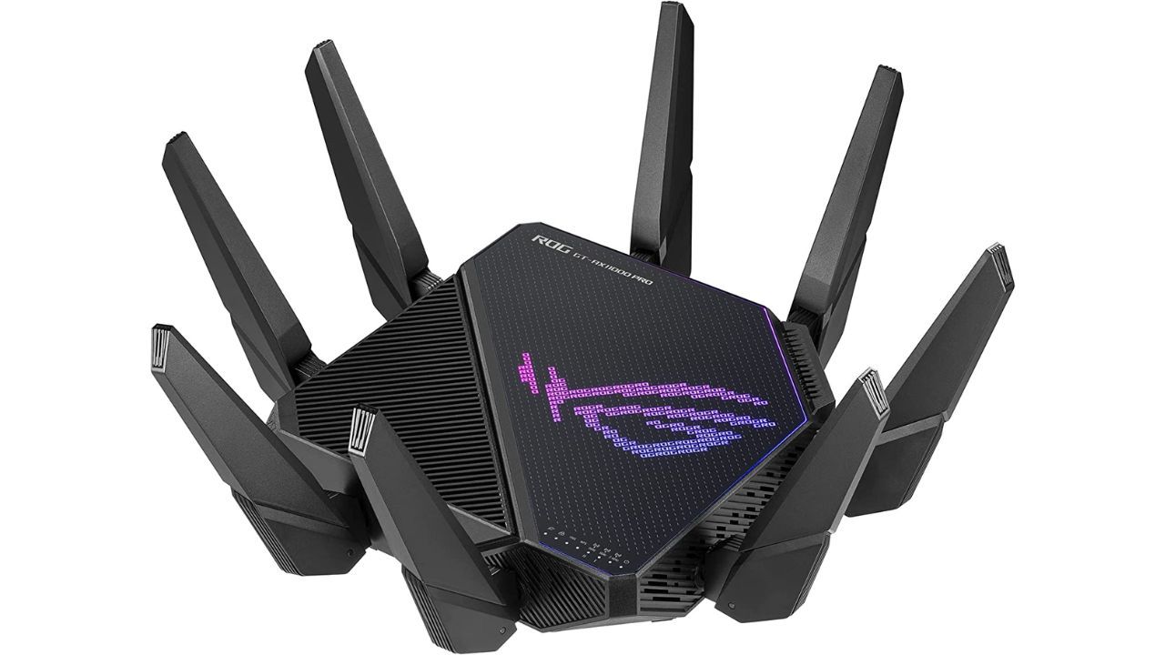 ASUS ROG Rapture GT-AX11000 Pro product image of a black router with multiple antennae and a purple logo on the top.