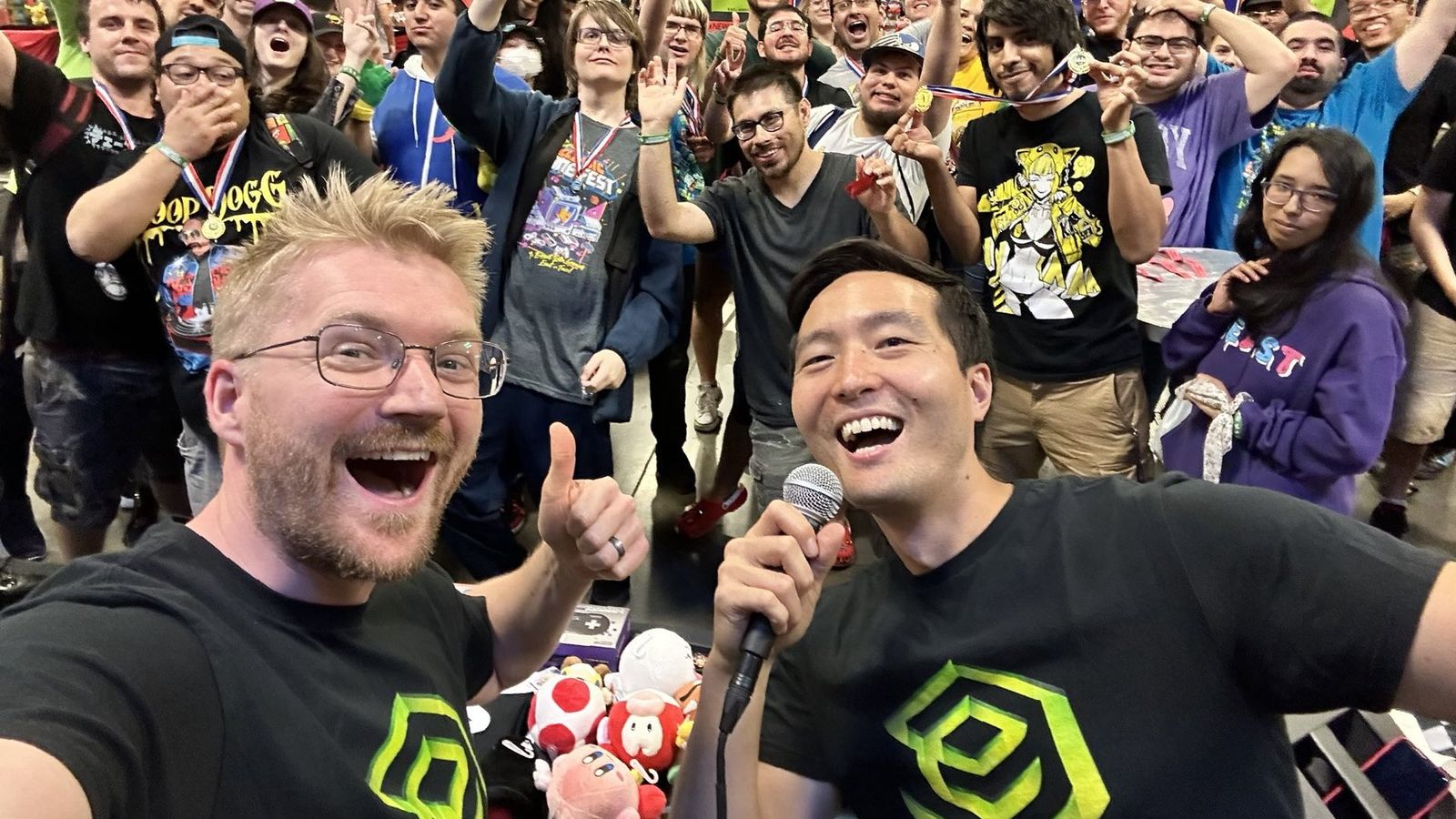 EON Gaming’s Justin Scerbo and Justin Chou celebrating in front of a crowd 