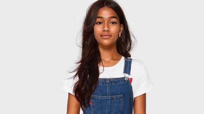 An AI generated model by lalaland.ai,  young black girl wearing dungarees 