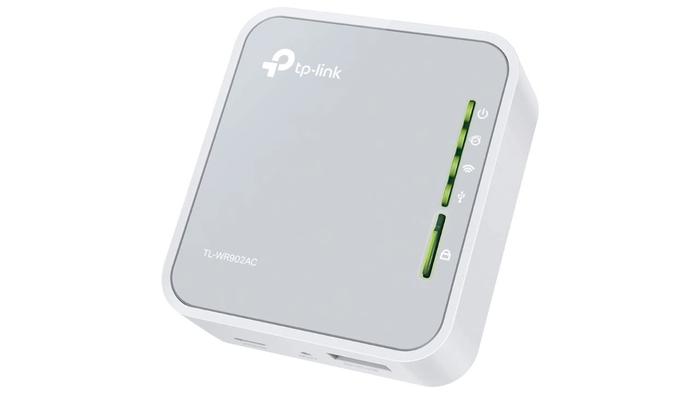 Best small Wi-Fi router - TP-Link TL-WR902AC AC750 product image of a square white router with green lights on the front.