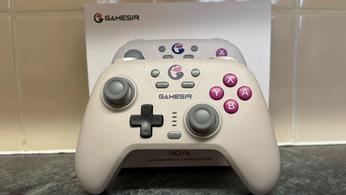 The Gamesir Nova controller in front of its box and in front of a tiled wall