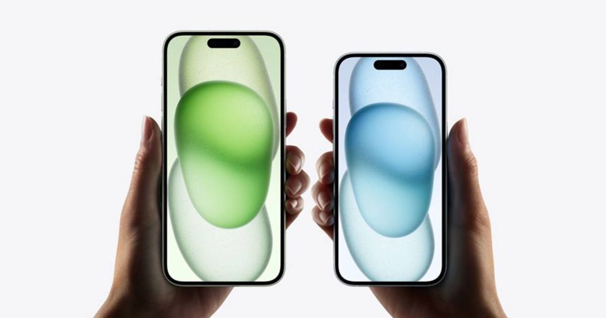 iPhone 15 storage options - An image of two hands holding two iPhone 15