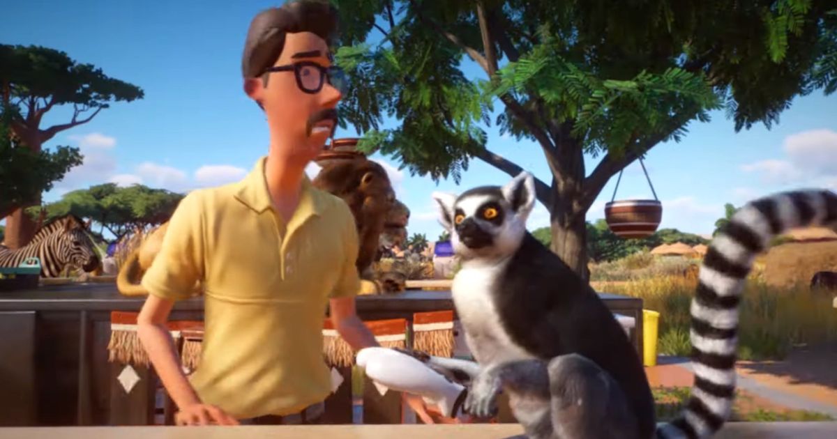 A Planet Zoo: Console Edition screenshot of a zoo keeper and a lemur holding a controller 
