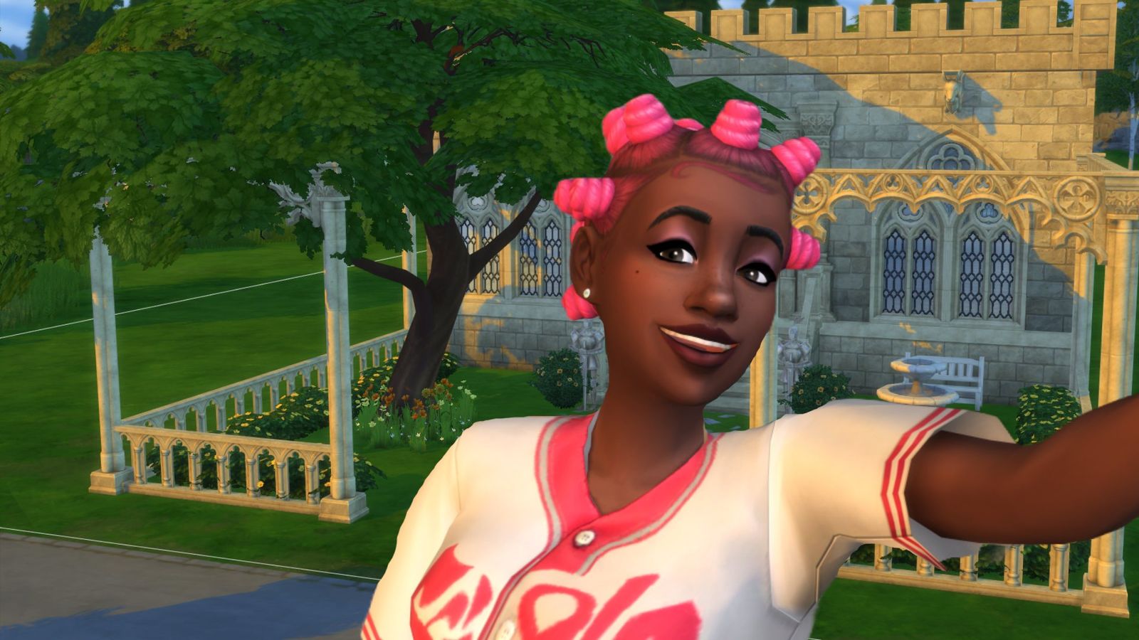 A Sims character posing in front of a castle made with the Castle Estate pack 