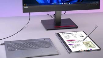 The Lenovo ThinkBook Plus Gen 5 Hybrid laptop mode plugged into a keyboard and Android mode being used as a notepad