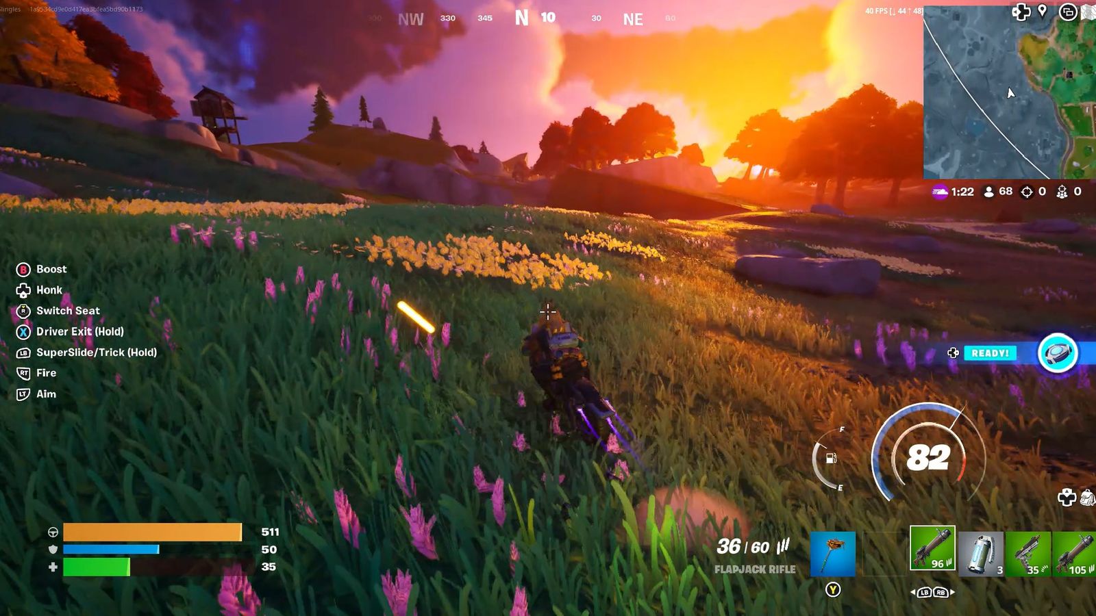 Fortnite character riding a motorbike into a beautiful sunset running on Amazon Luna Review 