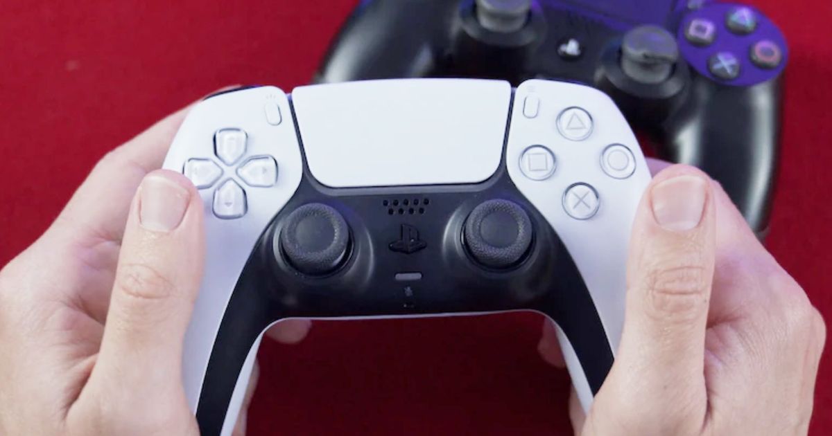 The PS5 Dualsense controller being held in the hands