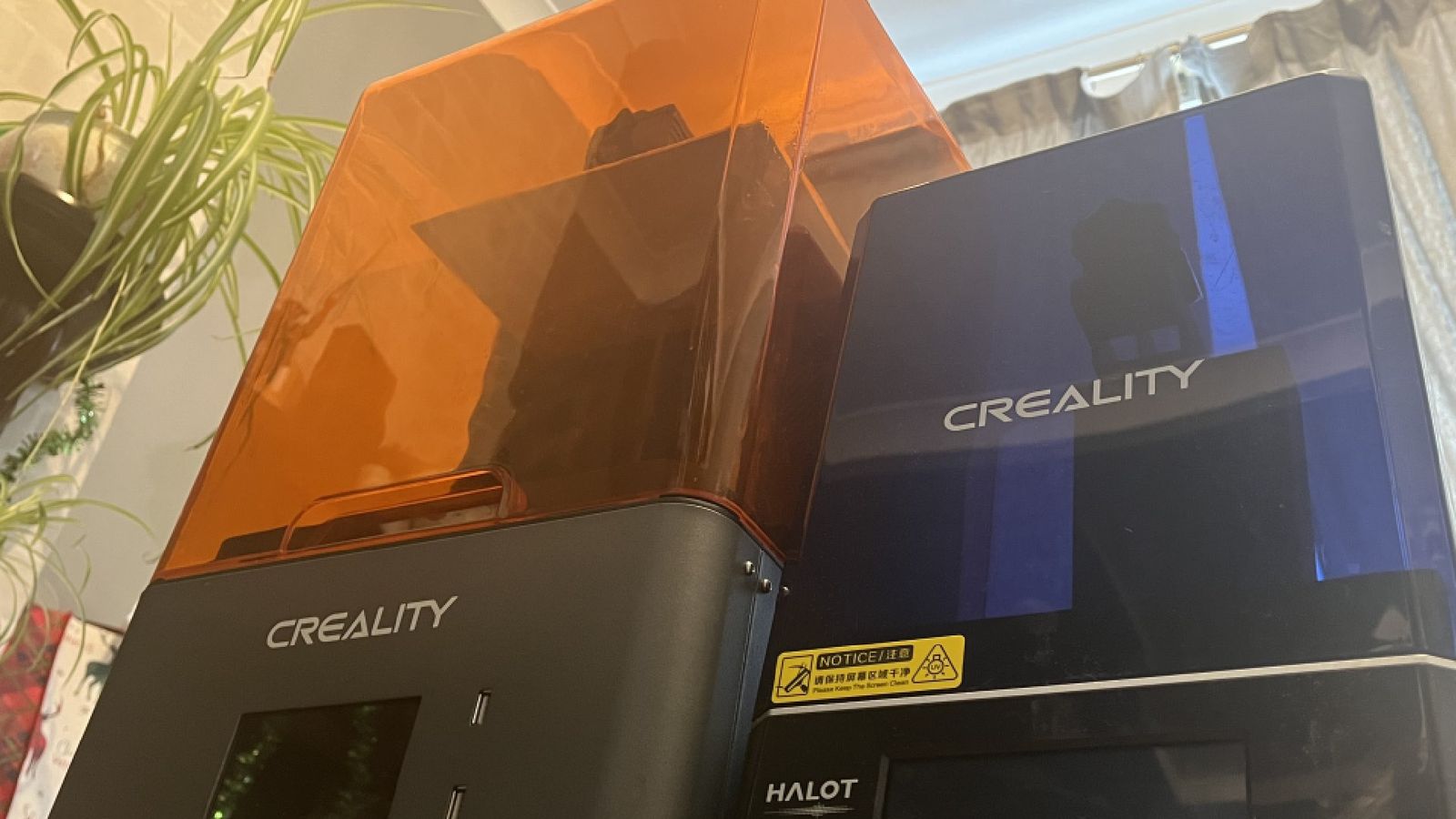 An image of the Creality HALOT-MAGE Pro next to the Halot One Pro. It’s a BIG 