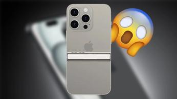 iPhone 15 Pro Max with a flip hinge for a foldable phone and in front of a gasping emoji