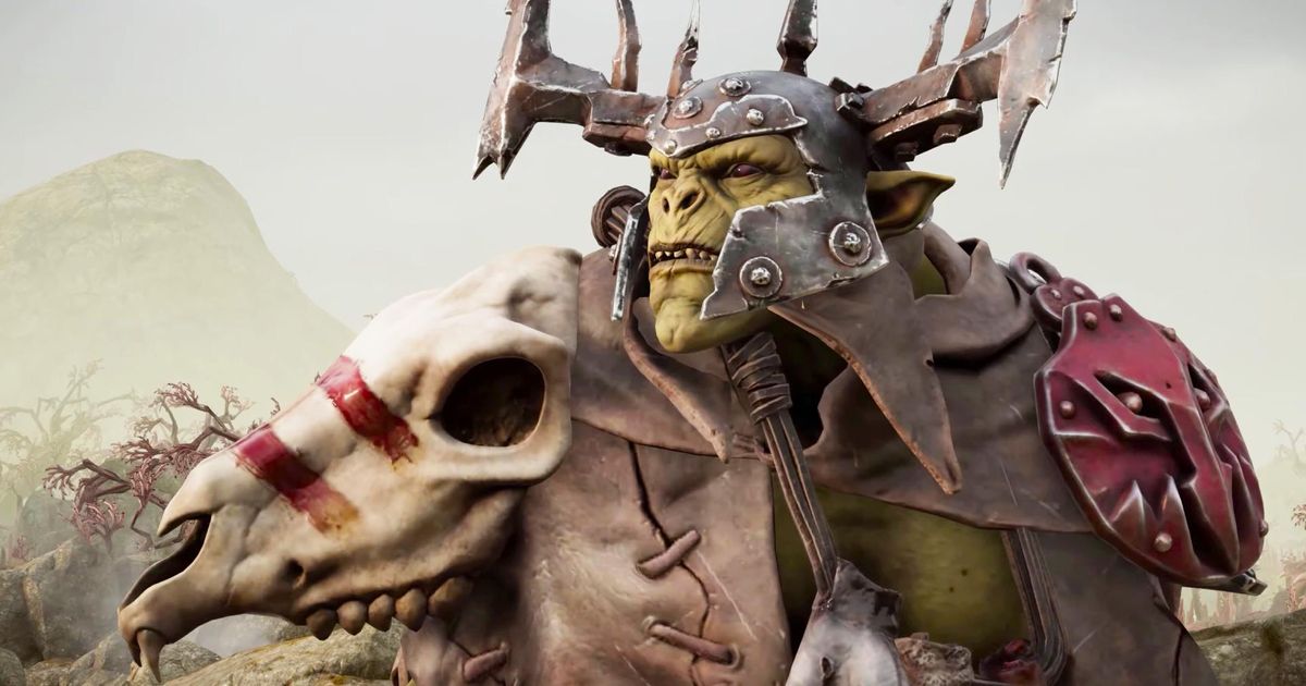 An Orc wearing a metal helmet and bone spaulders