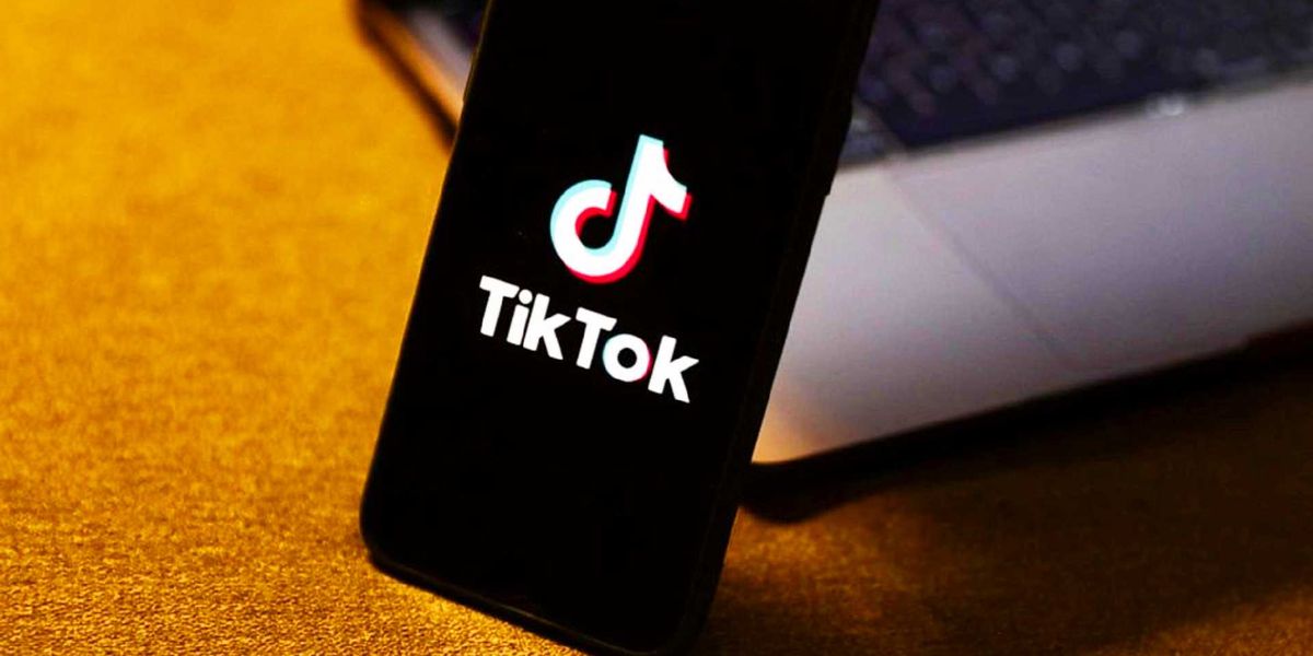 how to fix tiktok server error a phone with the tiktok logo on it