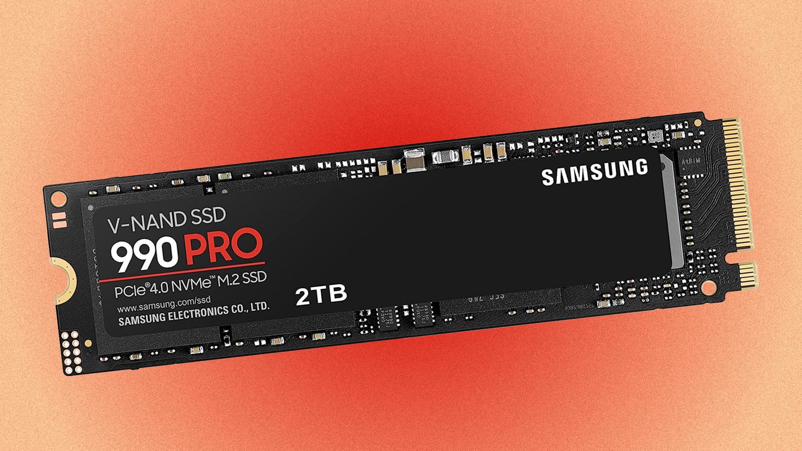 A Samsung 990 Pro NVMe SSD against a red and yellow background