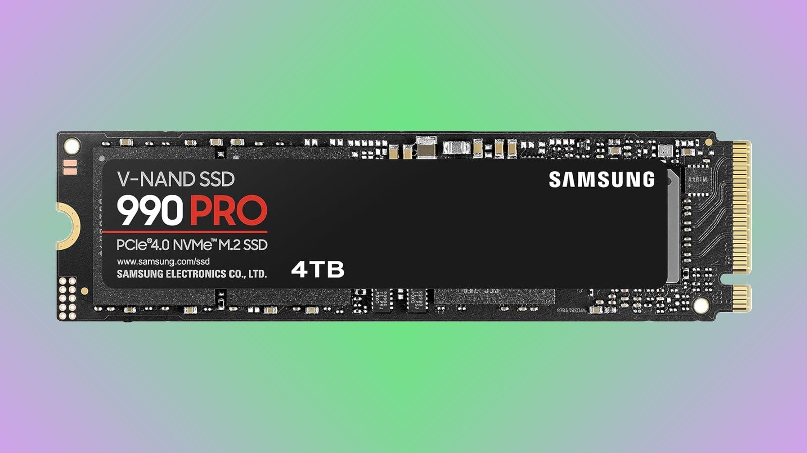 Samsung 990 Pro product image of a black SSD with gold connections featuring white and red branding.