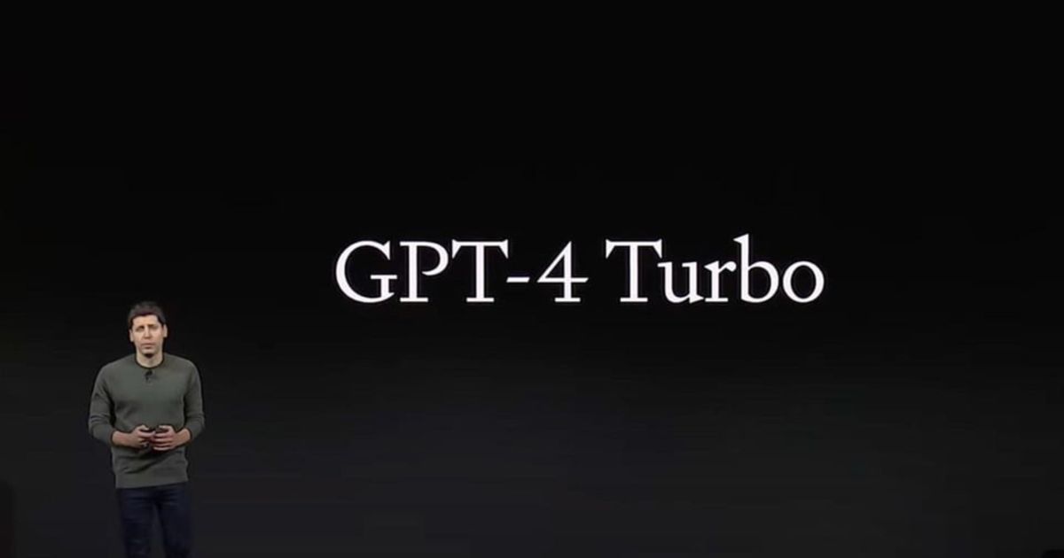 An image of Sam Altman presenting ChatGPT 4 Turbo