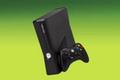 A tilted black Xbox 360 console 