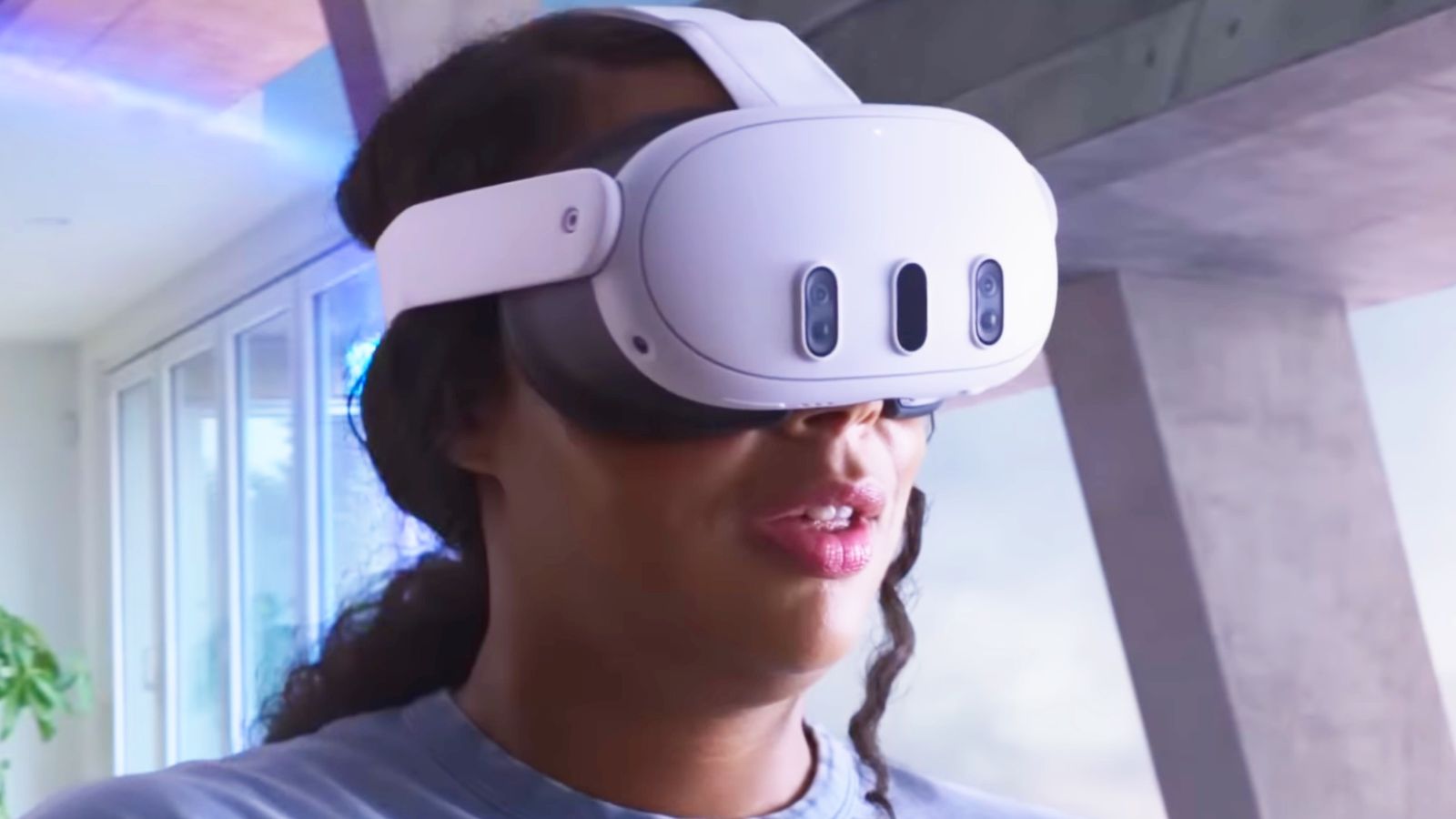 The Meta Quest 3 headset on a woman in an AR playspace