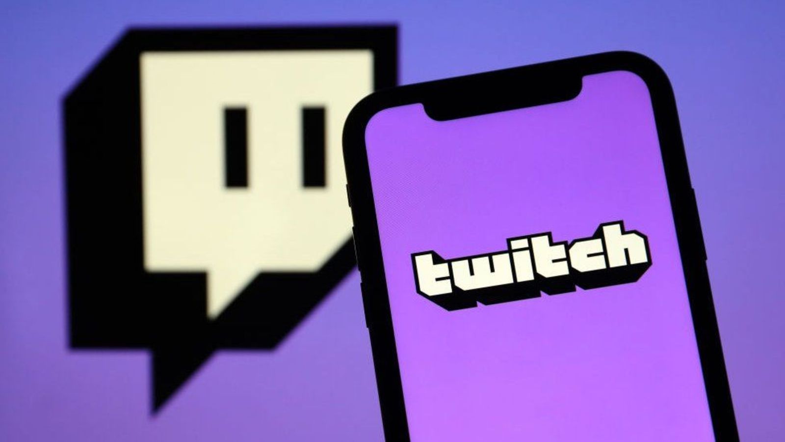 Affiliated - Twitch logo on a phone, in the background is the Twitch icon.