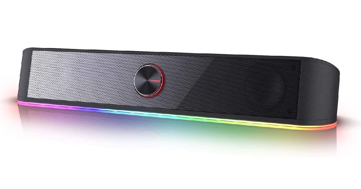 Redragon GS560 product image of a compact black soundbar featuring RGB lighting underneath.