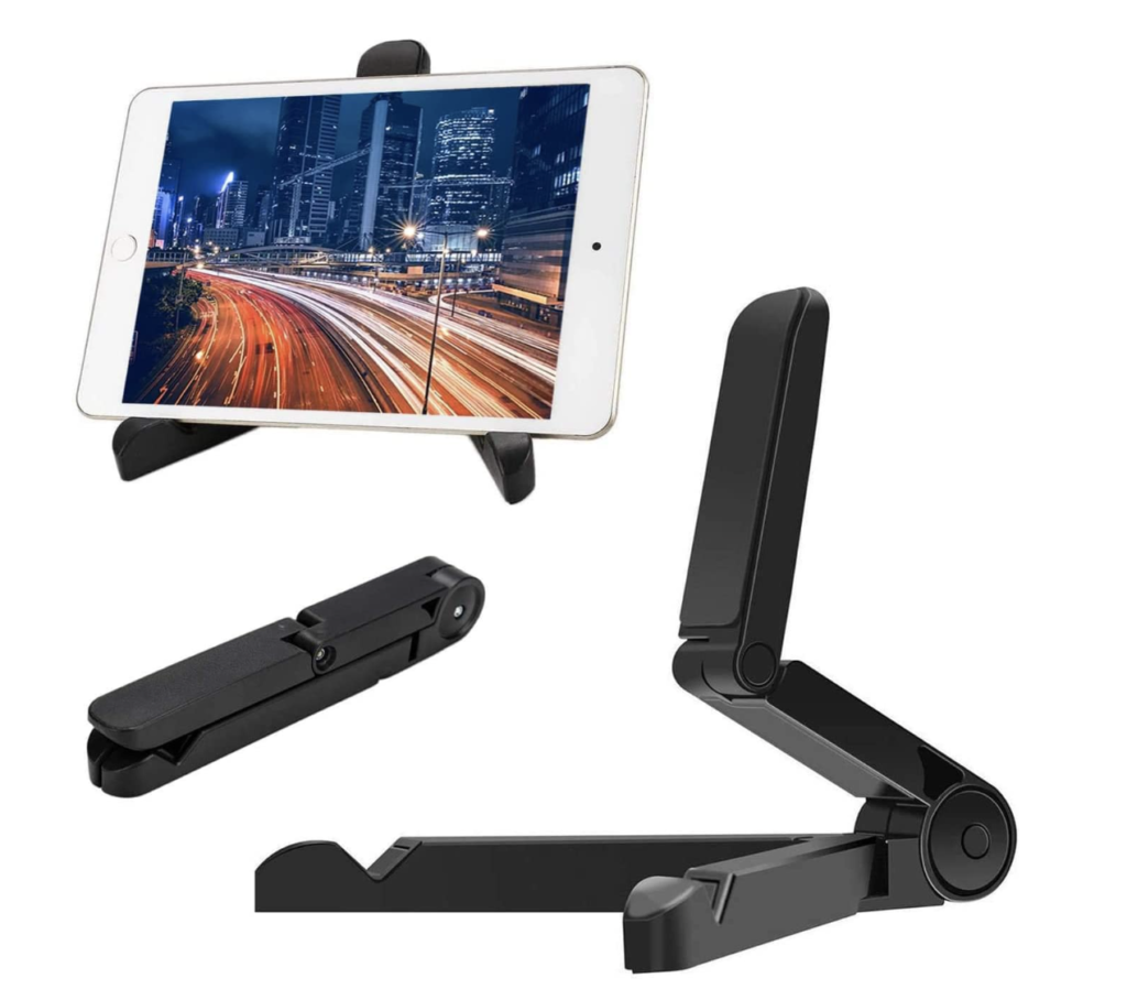 A black tablet stand with a white tablet resting on it.