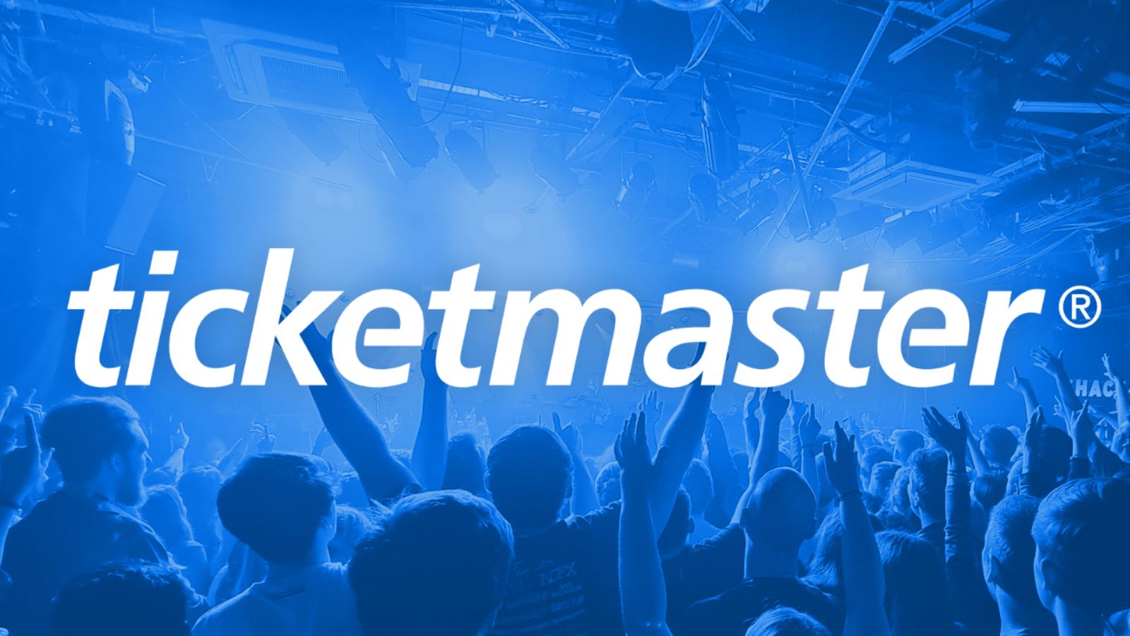 The Ticketmaster logo with an image of a concert crowd with a blue filter in the background